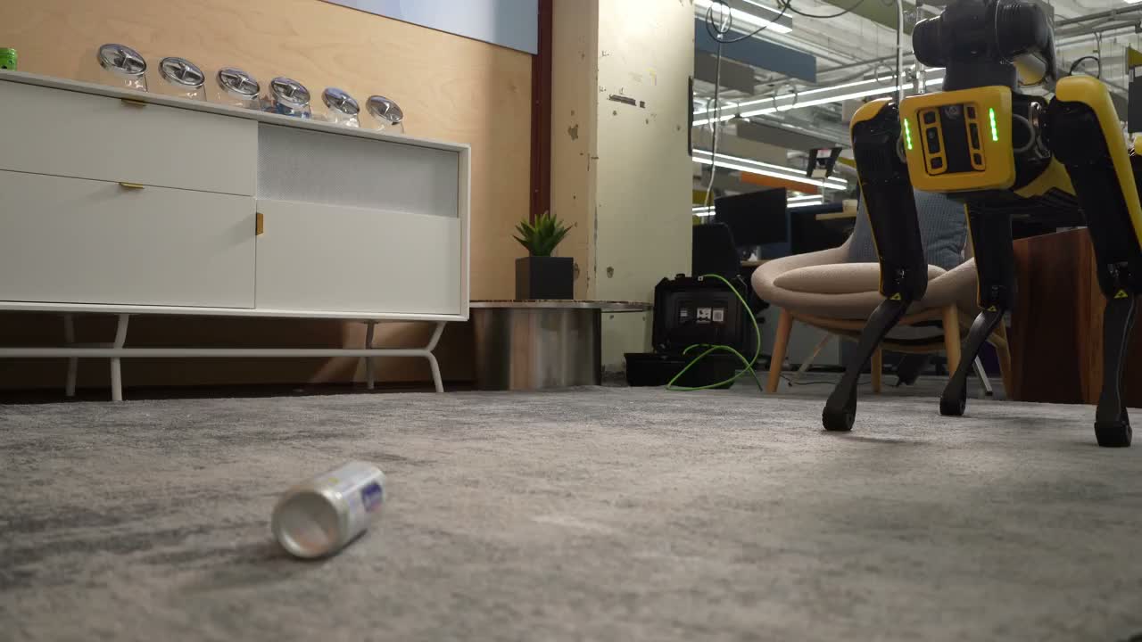 Boston Dynamics Spot robot interacting with a foot pedal in Google DeepMind’s Gemini robotics demonstration