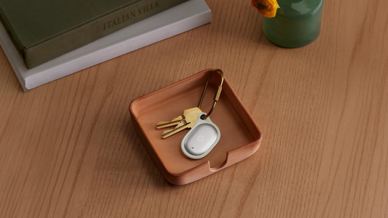 Google Pixel Tag attached to keys in a small tray.