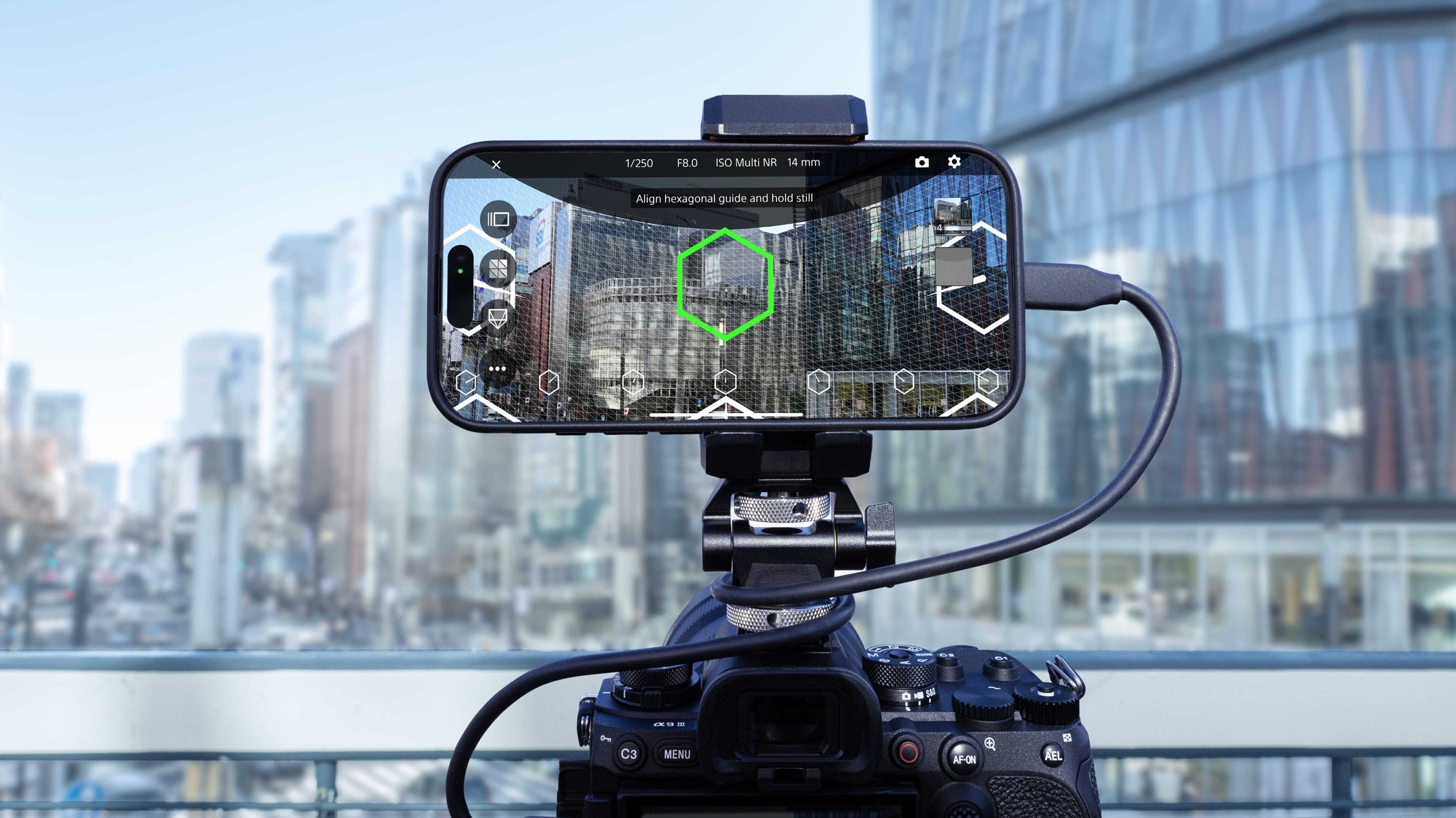 Sony camera with a mounted phone displaying augmented-reality guides for spatial capture.